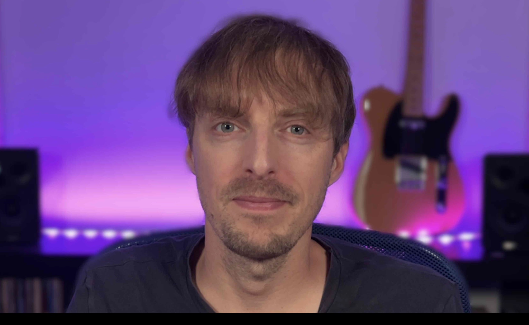 Person recorded with iPhone camera using Camo background blur feature and professional lighting setup